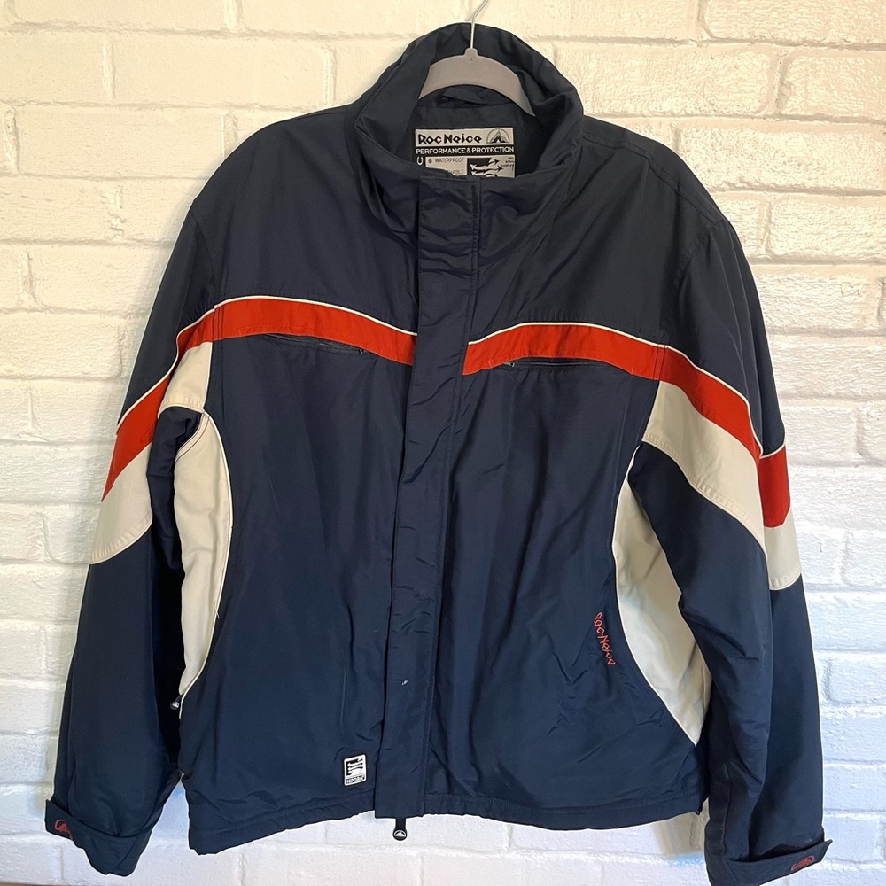 Vintage ROC Neige ski jacket in navy, white and earthy red/orange stripe.